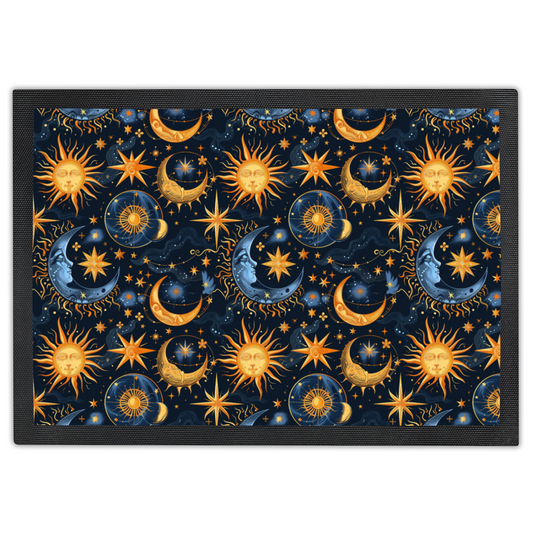 doormat with navy background and bright gold images of the sun, moon and stars