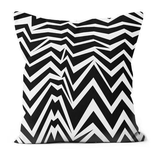 Bold black and white zig zag design on a cushion. 