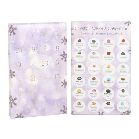 Inside a folded advent calendar showing 24 doors and pictures of what crystals maybe behind each door