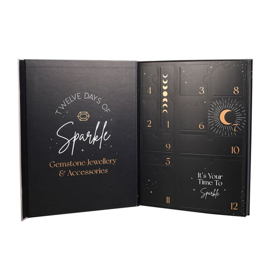 Black box with mystical designs. !2 doors inside containing 12 pieces of jewellery