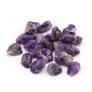A collection of raw amethyst gemstones, healing stones and crystals