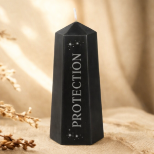 Black candle with protection written down the side